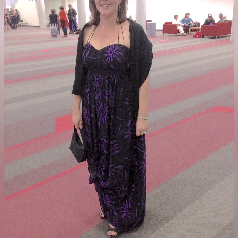 Cocktail Dress - Black strapless (or halter neck) with purple flower pattern.